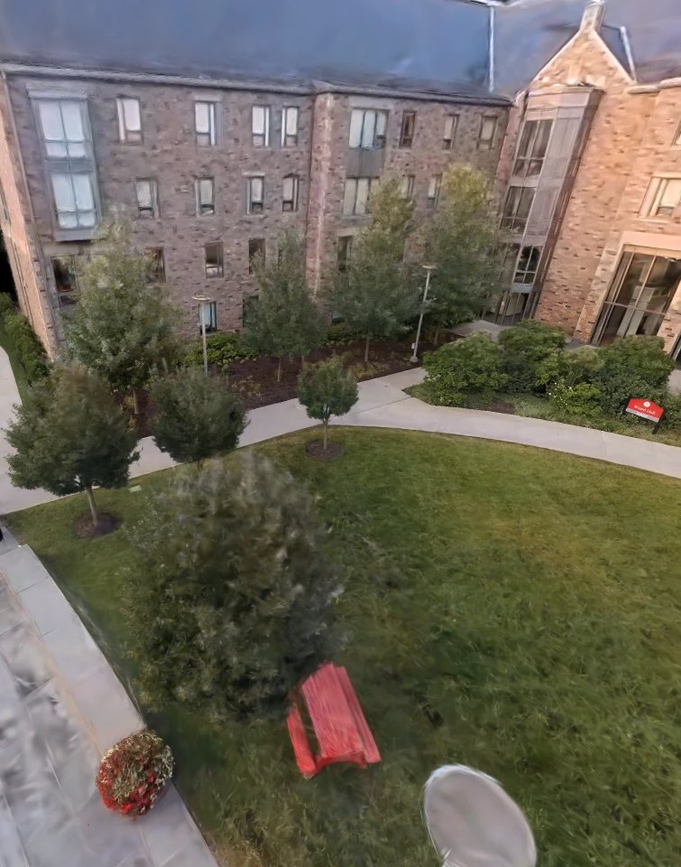 Photoreal 3D capture of a campus courtyard with brick residence halls, young trees, and a lawn